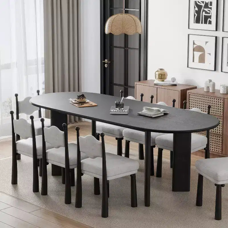 Table de salle à manger ovale incurvée de 79 po pour 6 à 8 personnes, table de cuisine moderne en bois massif avec plateau épaissi et base robuste pour salon ou cuisine, noire